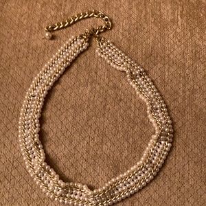 24 inch Pearl and gold 4 stand necklace.